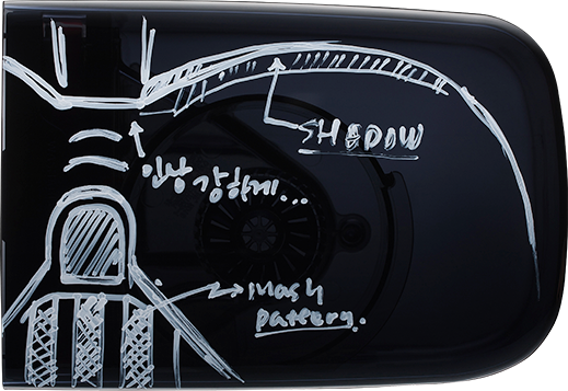 An image shows changes sketches and changes made during the design process of the Darth Vader POWERbot robot vacuum cleaner.