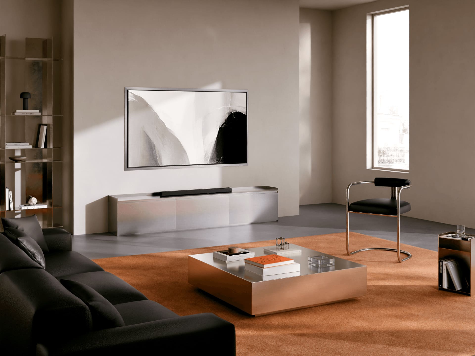 S95H Silver interior featuring sleek silver media console, black sofa, and warm orange carpet for a contemporary and sophisticated living room.