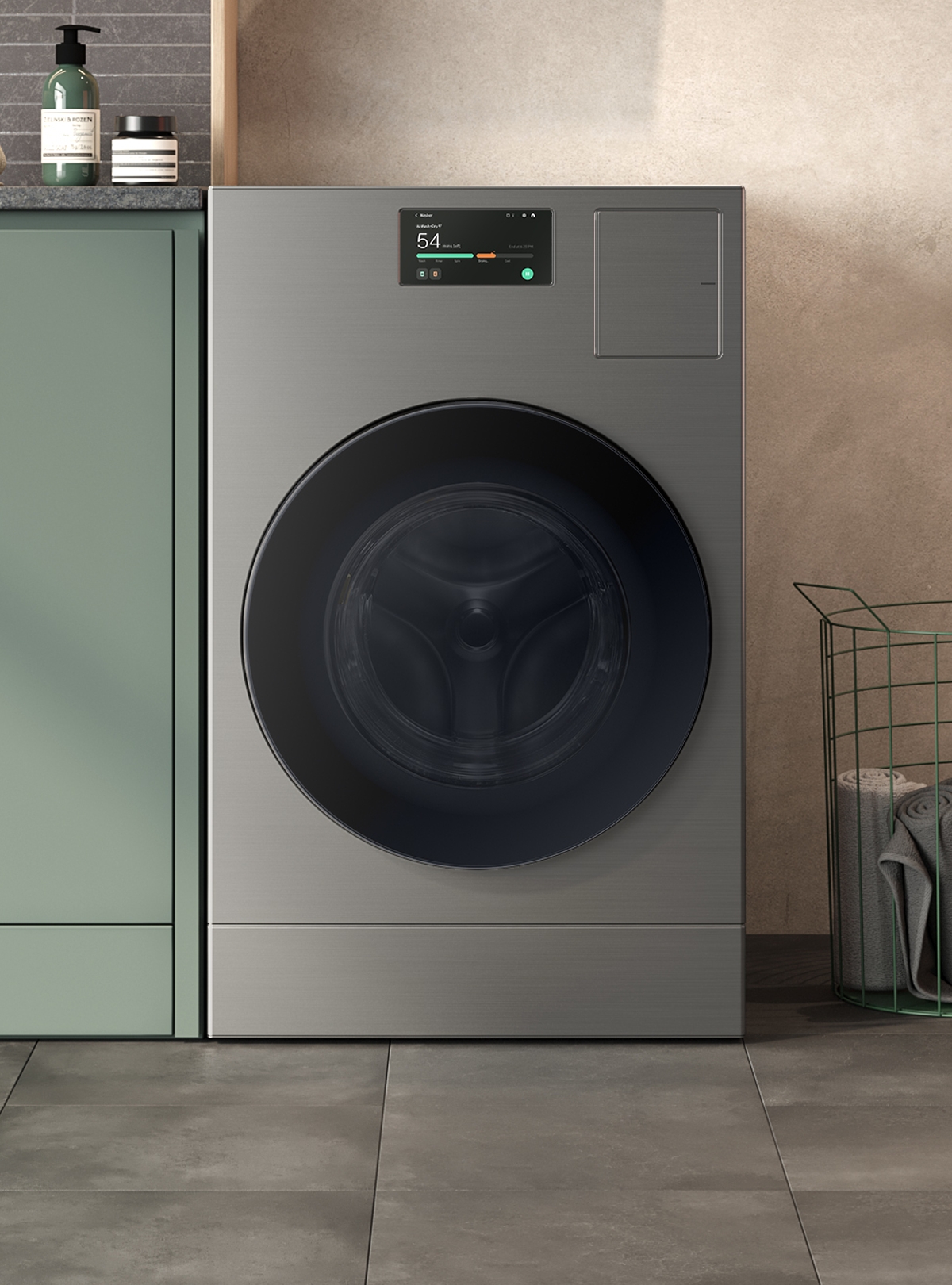 A dark gray washing machine in a laundry room. At the top center is the control panel, and at the far center is a large circle of black translucent doors.