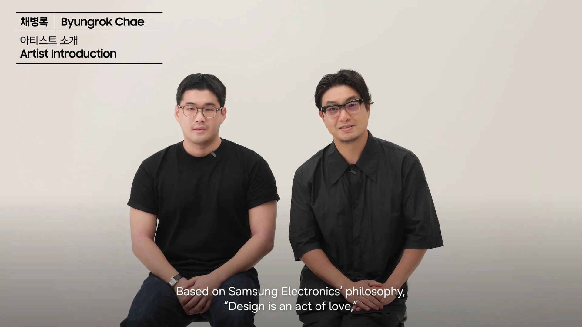 Byungrok Chae artist introduction video thumbnail showing two people seated side by side against a light background.