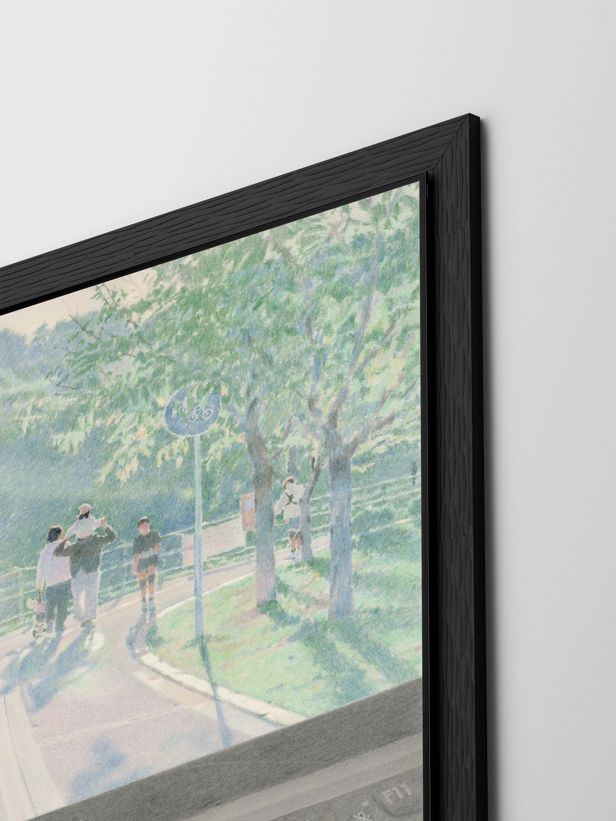 Inside a dark wooden frame with hand-carved-looking grain, the Galaxy Book6 Pro, a slim laptop with a screen and keyboard, is open. Beyond its screen, several people walk along a leafy summer path with long blue shadows.