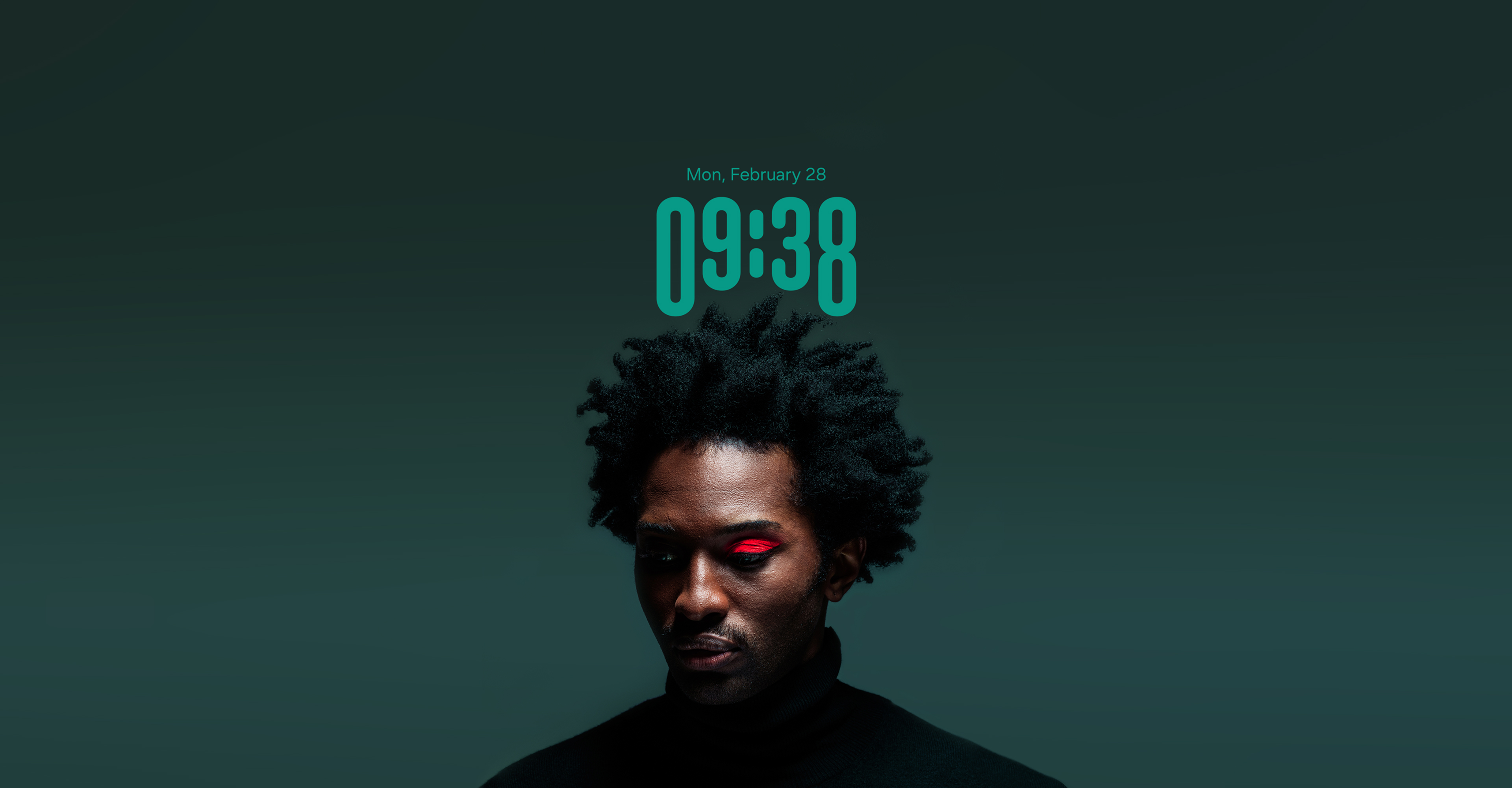A watch face image featuring a Black man in a turtleneck, gazing toward the lower left against a deep teal background. His right eyelid is highlighted with a bold red eyeshadow.