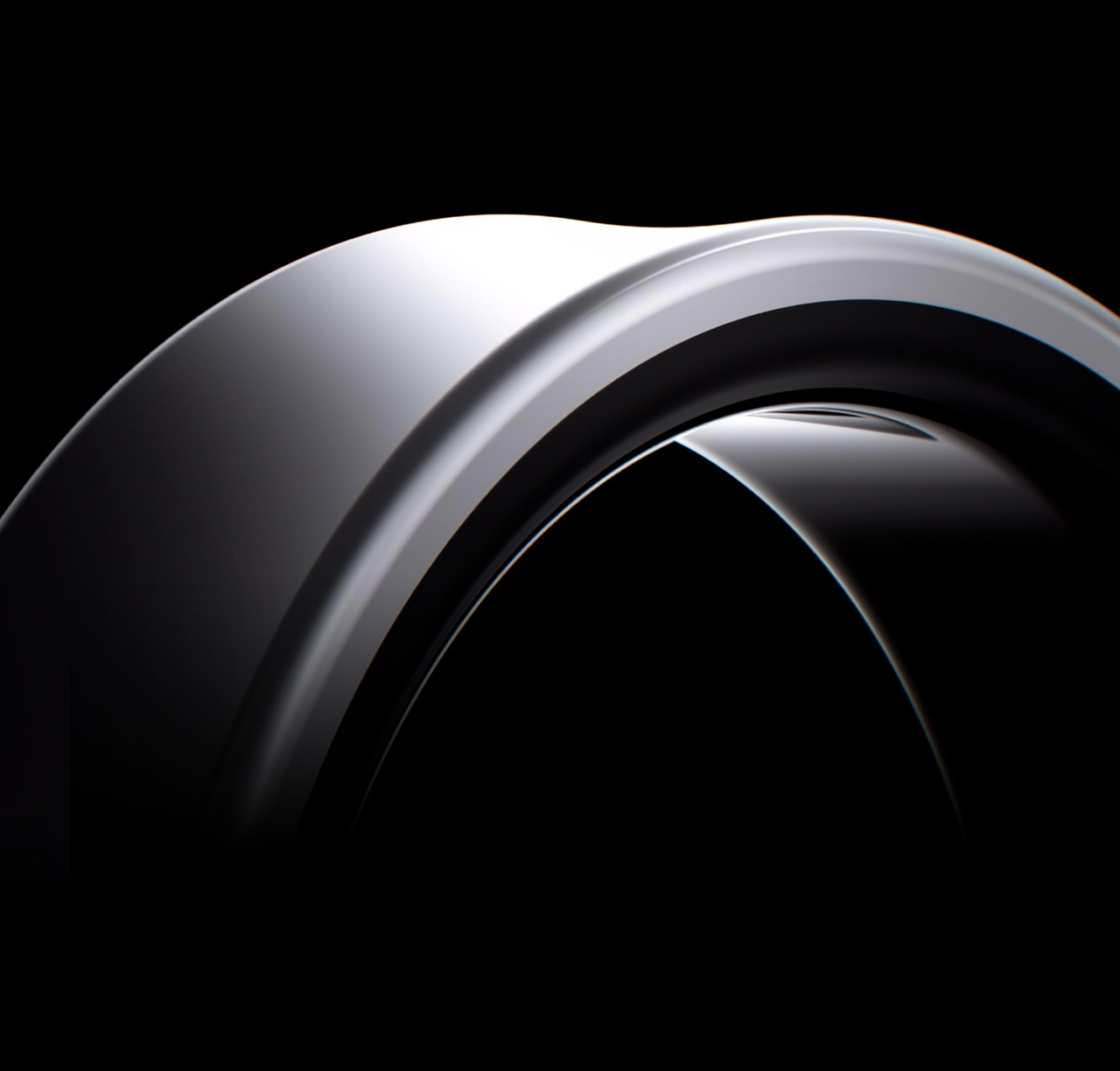 Bottom image of the Galaxy Ring titanium silver. The outer surface is facing the sky and the bottom of the ring is facing to the right. The outer surface, which is visible when it is on the finger, has a concave curved design. The bottom of the ring, the titanium silver part that connects to the outer surface, is also gently curved to the black part on the finger.