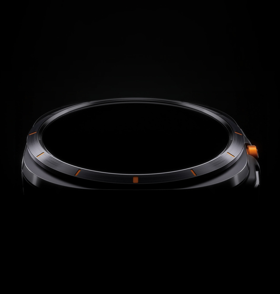 A circular border sits on top of a Galaxy Watch Ultra the cushion sculpture with four curved angles. The image is angled slightly below eye level, making the circular border appear oval. Notice the orange scale on the circular border and the orange quick buttons on the right side.