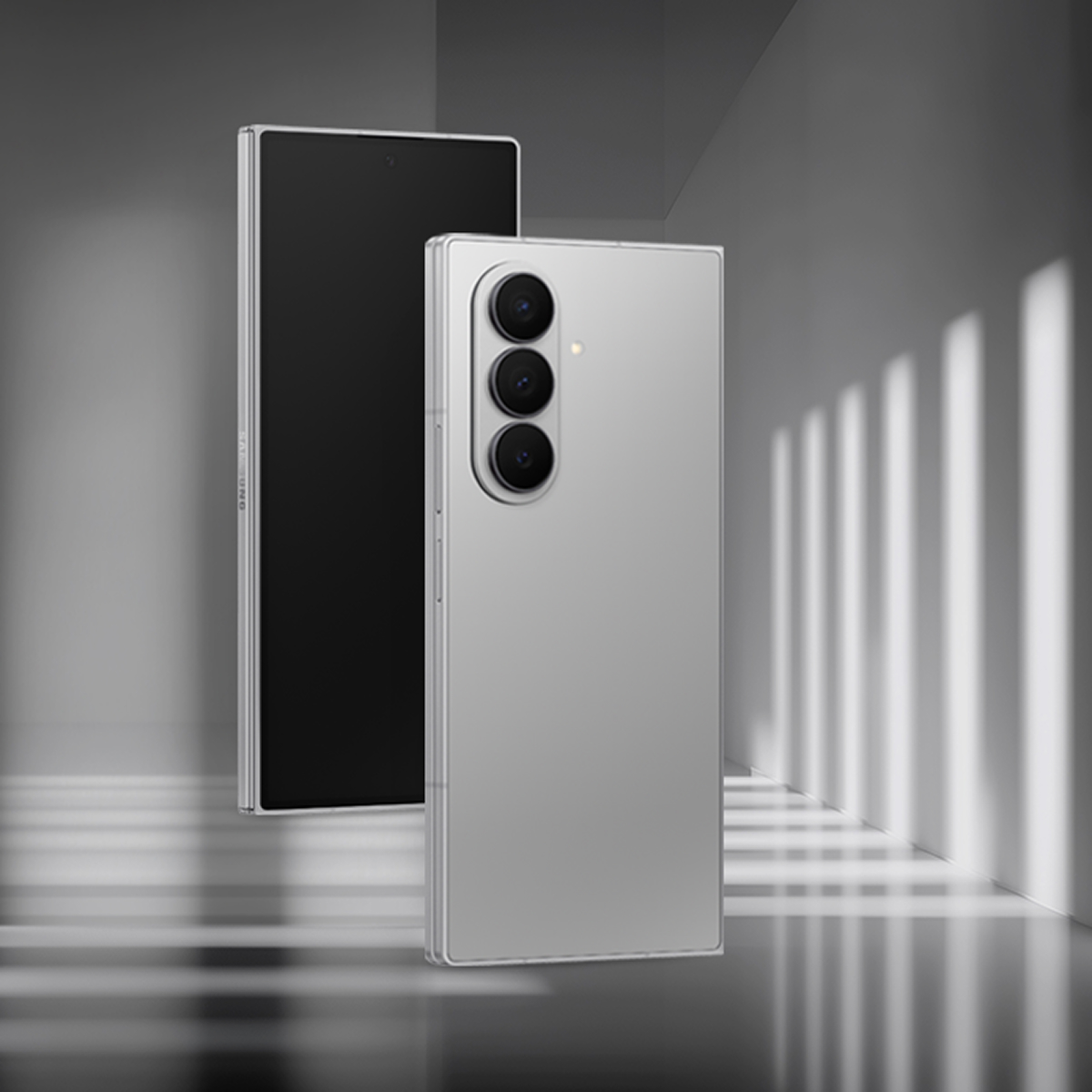 Galaxy Z Fold7 in Silver Shadow color, highlighted as light filters through pillars in a modern space