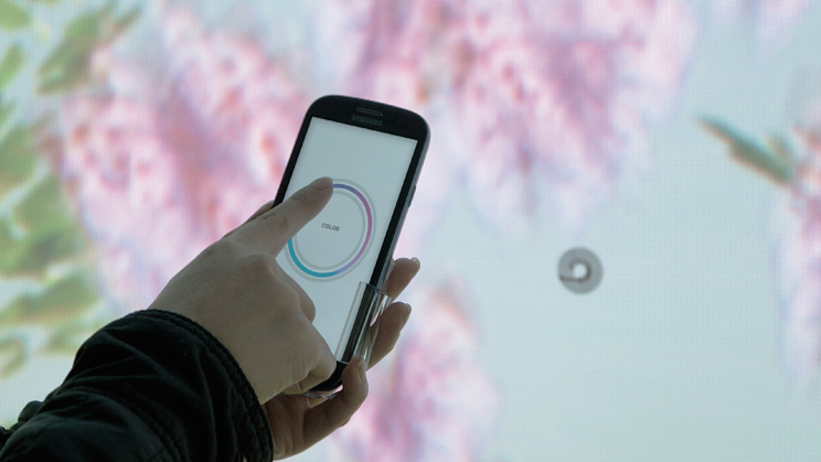When users held up Samsung’s Galaxy S3 to a red dot on the display, they immersed themselves in a world created by the digital displays.