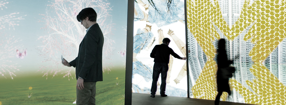 The visitors were holding the mobile phones to the wall.