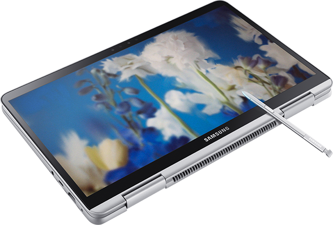 The laptop featuring floral imagery is floating lightly.