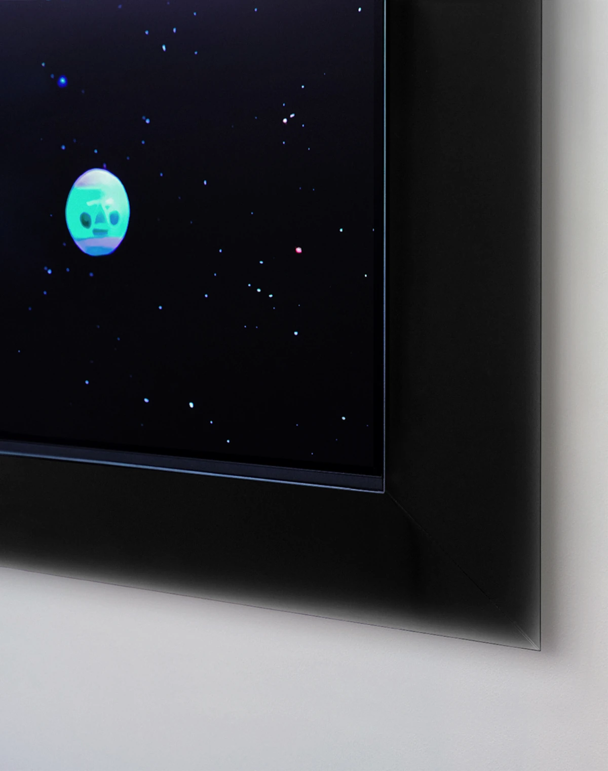 Inside a black and gray frame, a Bespoke AI Refrigerator Family Hub stands in a star-filled outer space scene. Colorful round planets with faces float around it, while a small character in a blue spacesuit appears on the refrigerator’s screen.