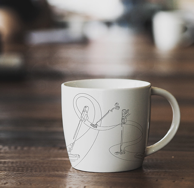 An image shows the POWERStick Pro cleaner illustration featured on a coffee mug.