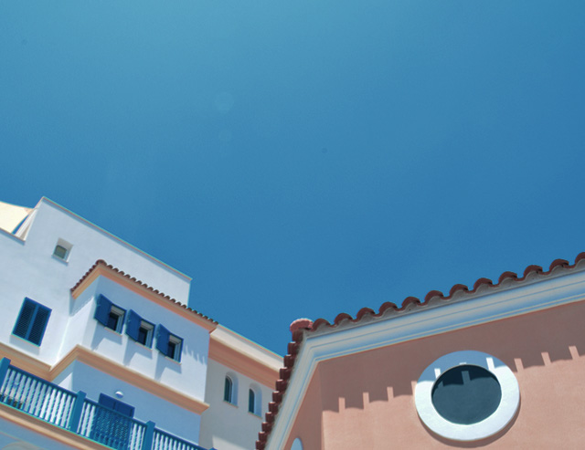 An image of clearness sky between buildings.