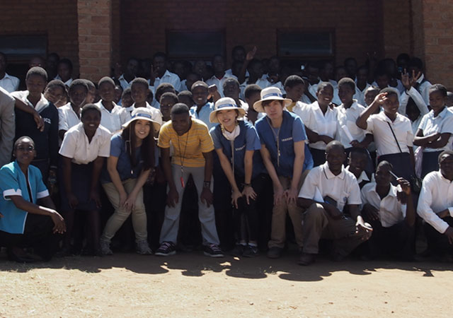 An image shows teachers, students, and Samsung employees that participated in Shiny School